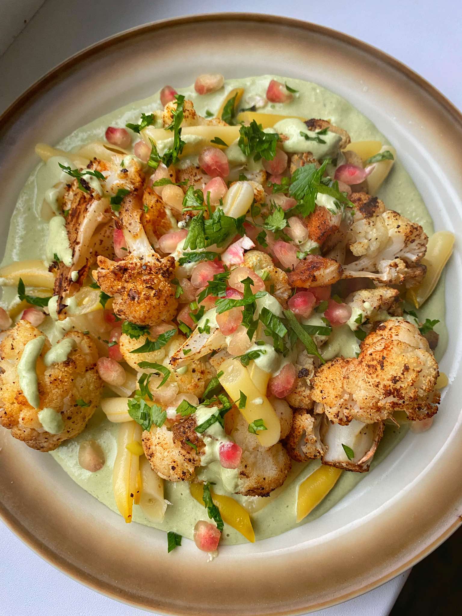 Roasted Cauliflower with Green Tahini Sauce - Tasty Simply Vegan